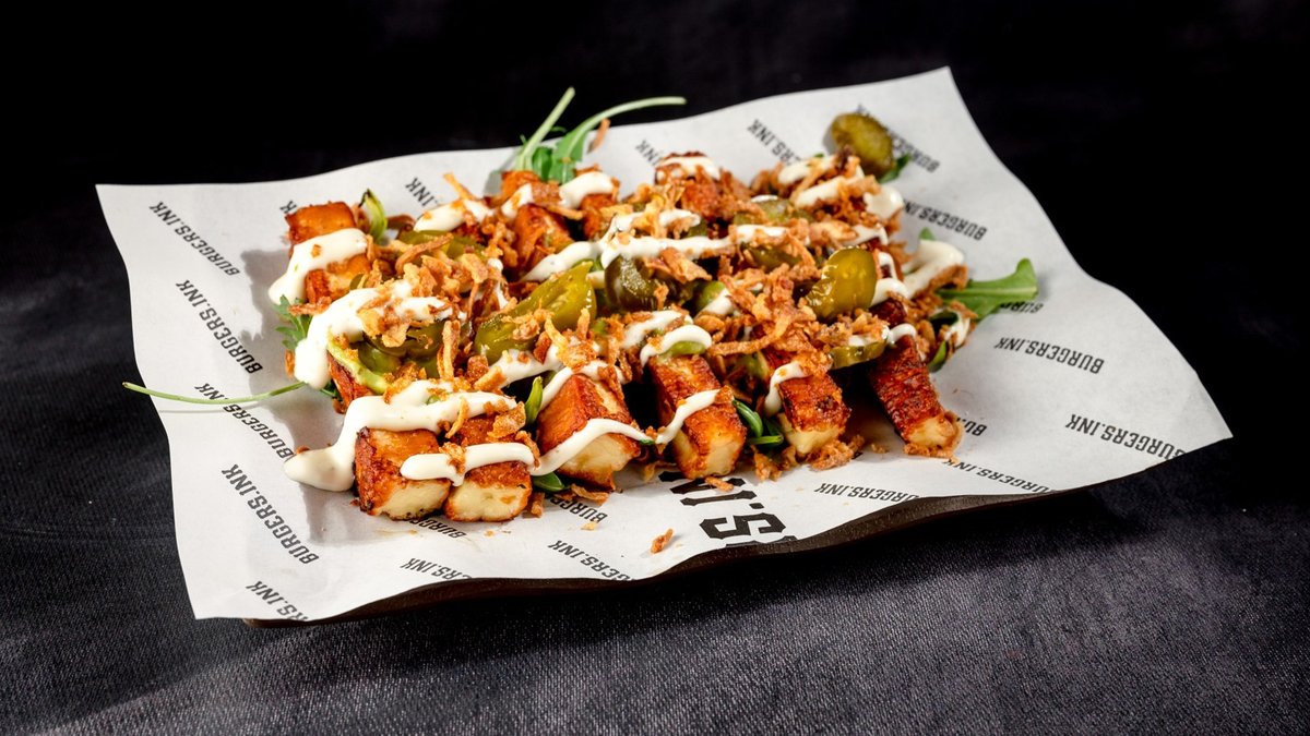 Halloumi Fries (V) – Guacamole, crispy onions, jalapeño, sour cream