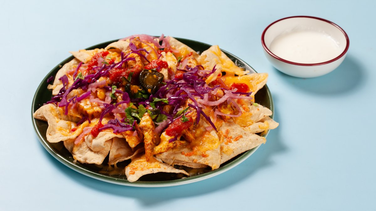 Mexa Barne Nachos – Gratinert nacho chips servert med rømme.